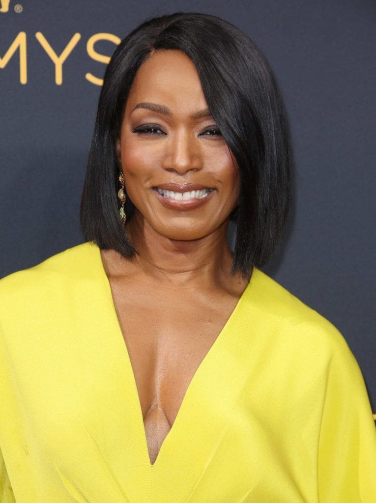 Angela Bassett on the red carpet with her dark brown hair cut into a long bob and worn straight