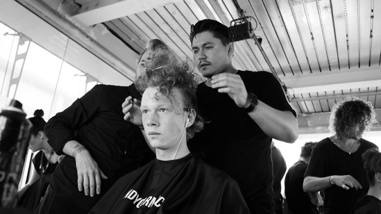 Male grooming: black and white pic of Kieron Webb Global Creative for Lynx and Axe styling hair