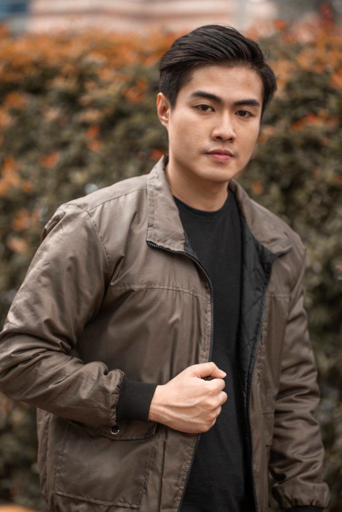 Asian man with modern quiff for men wearing a jacket